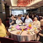 Alumni guests enjoying dinner at a round banquet table during the CKSC Taiwan Induction 2025