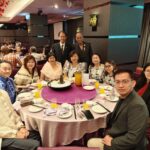 Group seated together at a lively round table setup