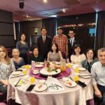 Formal group photo of CKSC officers and event hosts