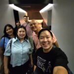 Group selfie of youth committee members post-screening