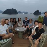 CKSCAA52 group photo with scenic Vietnam bay in the background
