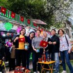 Group photo with lanterns during Vietnam night street visit