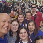 CKSCAA52 group selfie in a busy Vietnam street
