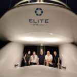 CKSCAA52 members posing at Elite of the Seas cruise entrance