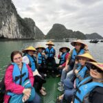 Group wearing life vests during Halong Bay boat tour