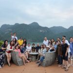Alumni group enjoying rooftop view during Vietnam tour